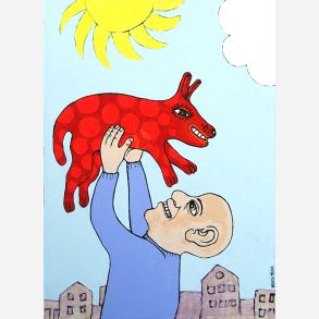 Mand som leger med sin hund